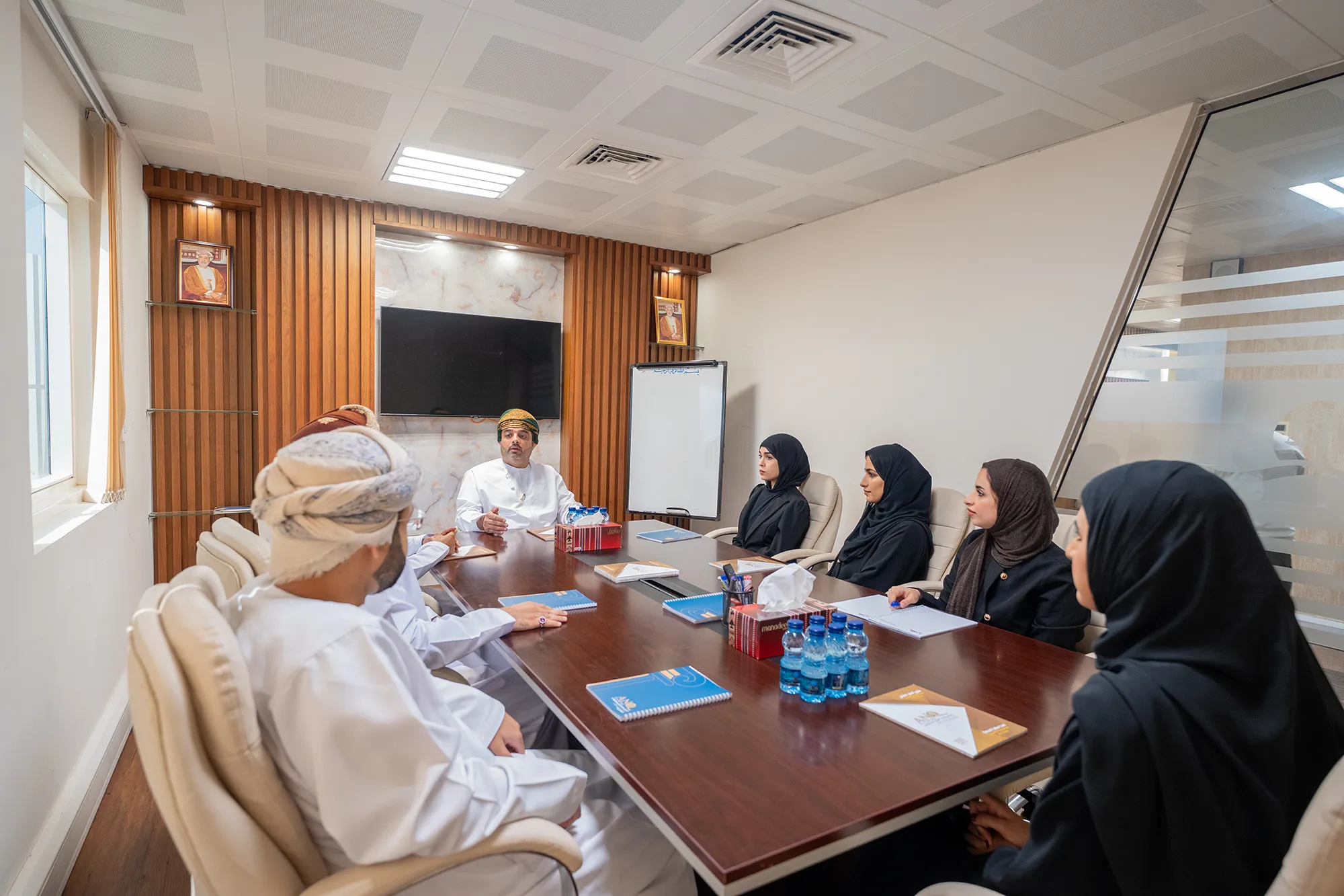 An ANQ & Co partner leading a boardroom meeting